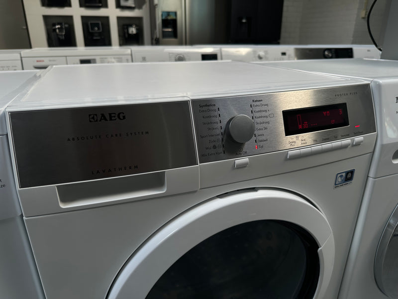 AEG || LAVATHERM || 9KG || ABSOLUTE CARE SYSTEM || WARMTEPOMPDROGER || VOORLADER ||