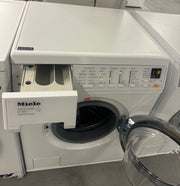 Miele SoftCare W3833 wasmachine met geopende deur en zicht op de trommel