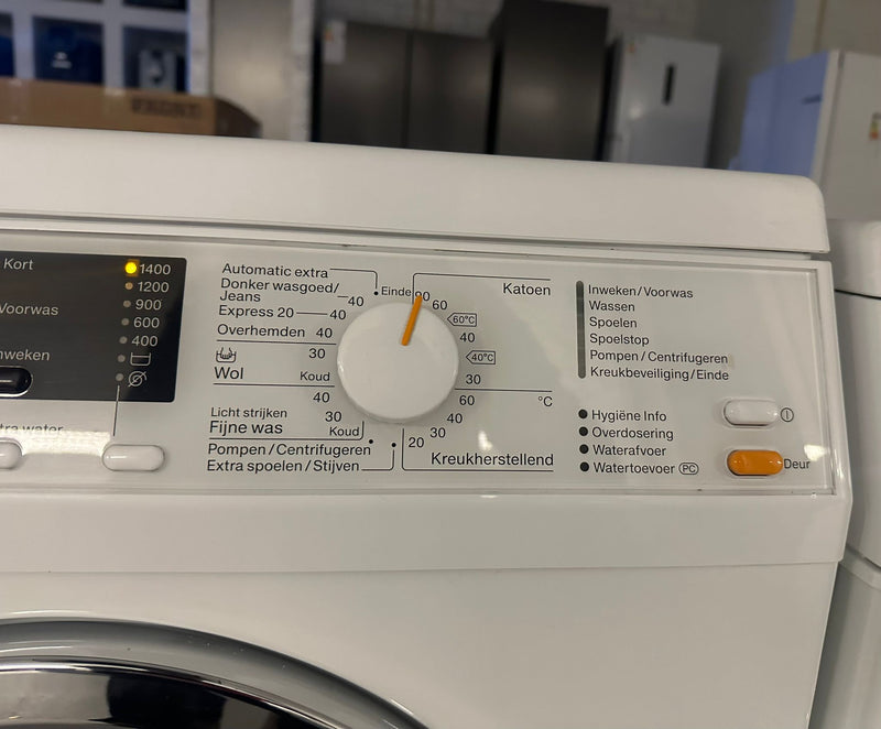 Miele WDA 111 W Classic Eco wasmachine met geopende deur en trommel