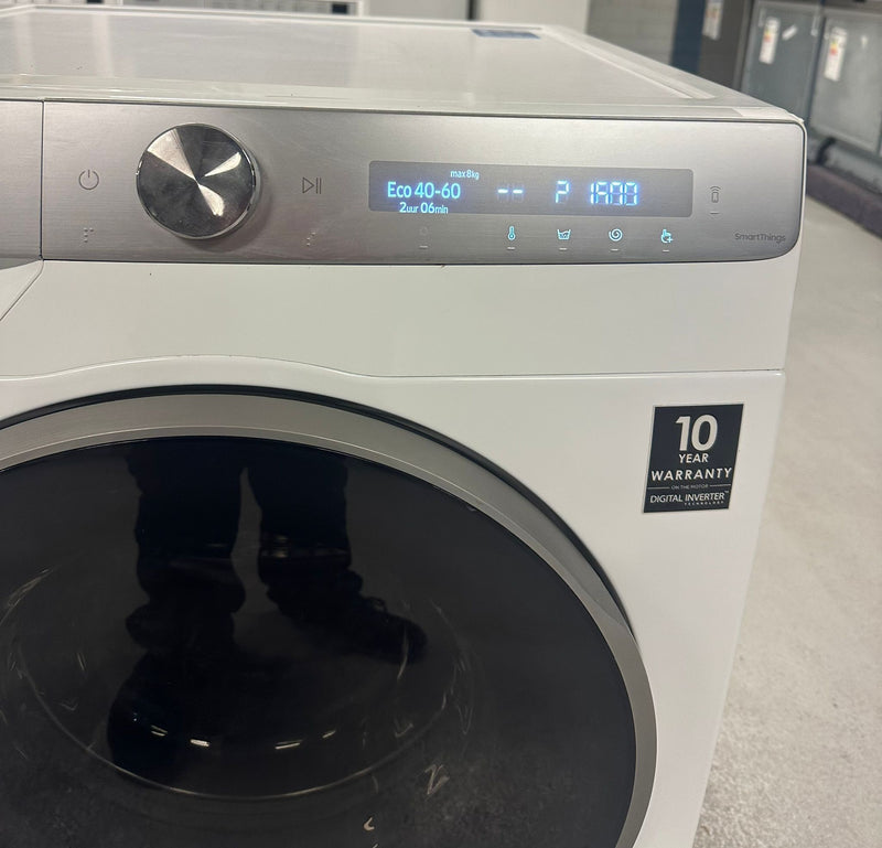Samsung WW80T936ASH wasmachine met geopende deur en zicht op de trommel