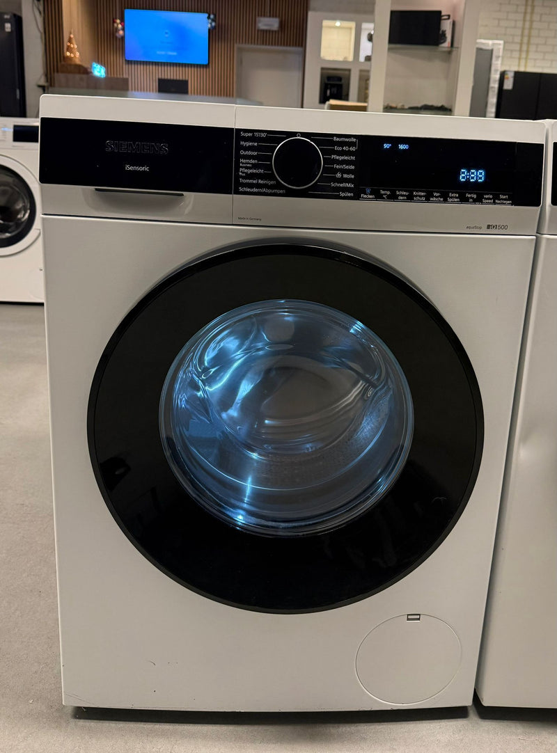 Close-up van het bedieningspaneel en de programmaknop van de Siemens WG56G2M40